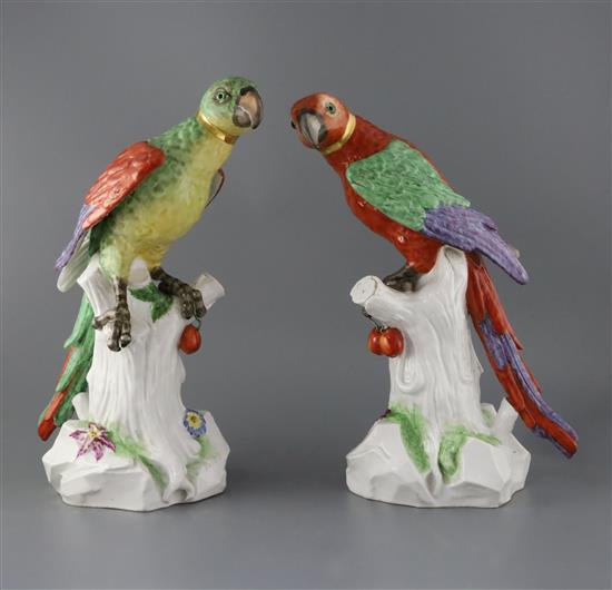 A pair of large German porcelain models of parrots, late 19th century, H. 40.5 and 42cm